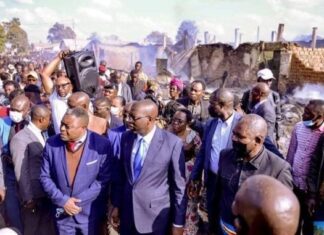 UNE FEMME ET SES ENFANTS DANS UN INCENDIE