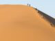 “Namibia Outraged: Tourists’ Nude Photos at Big Daddy Dune Spark Controversy”