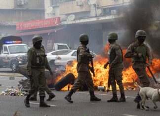Mozambique Opposition Leader’s Convoy Attacked as Police Crack Down on Protesters