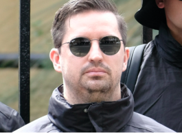 Australia detains South African man after appearance at neo-Nazi rally