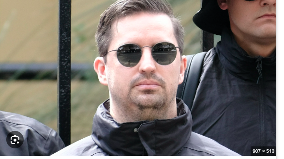 Australia detains South African man after appearance at neo-Nazi rally